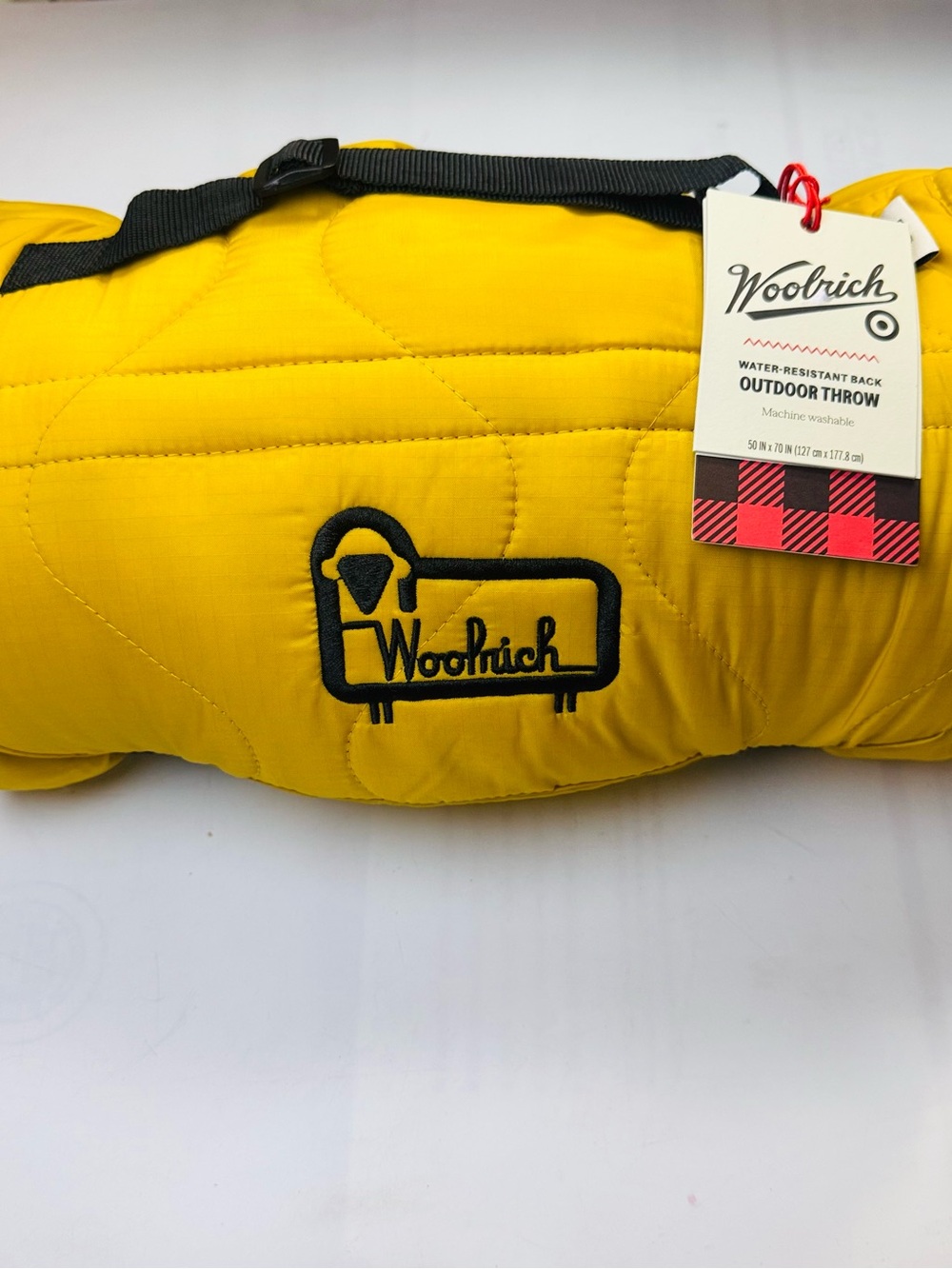 Woolrich water resistant back outdoor throw